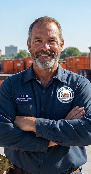 Peter, Lansing Dumpster Co operations director, at the South Larch Street yard